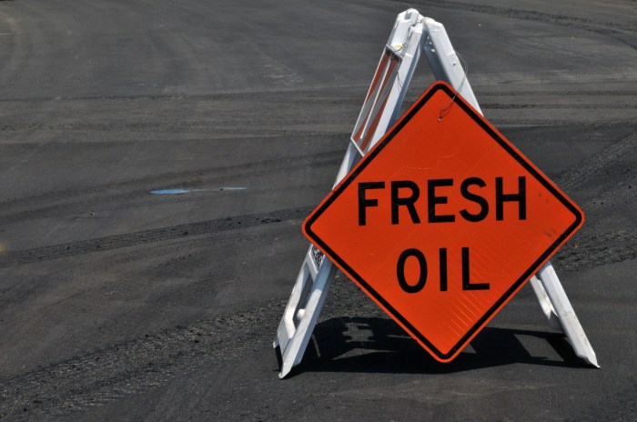 Fresh oil road sign meaning