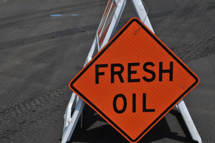 Fresh oil road sign meaning